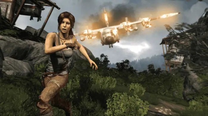 لقطة شاشة تحميل لعبة Tomb Raider على الكمبيوتر الشخصي، تظهر فيها لارا كروفت وهي تستكشف بيئة الغابة الخصبة ذات الآثار القديمة.