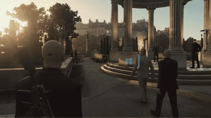 صورة ترويجية لتنزيل لعبة Hitman: Blood Money المجانية للكمبيوتر الشخصي، تظهر شعار اللعبة وخلفية بها مشاهد أكشن.