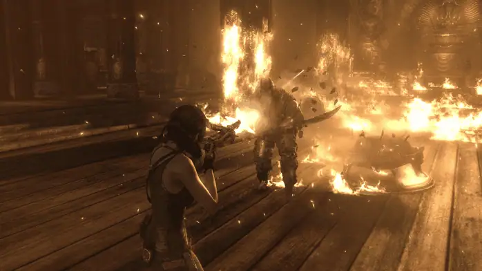 صورة ترويجية للعبة Tomb Raider تظهر شخصية تستكشف منطقة وعرة على جهاز الكمبيوتر.